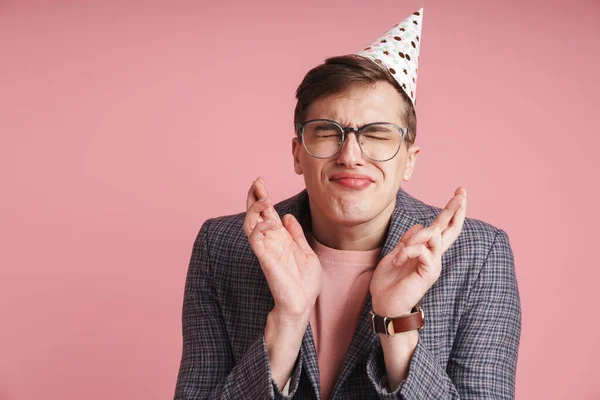 Portrait Upset Young Man Wearing Birthday Hat Celebrating Isolated Pink — Stock Photo, Image