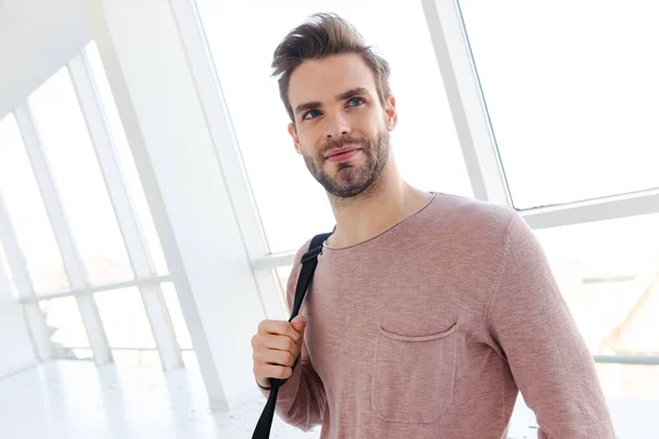 Image Young Bearded Man Bag Smiling While Standing Bright Window — Stock Photo, Image