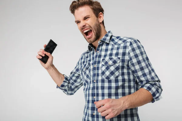 Portret Van Een Boze Jongeman Die Schreeuwend Een Geruit Hemd — Stockfoto