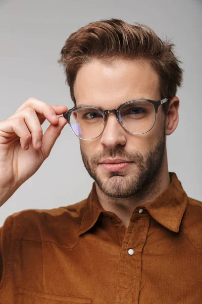 Portrait Unshaven Young Man Wearing Eyeglasses Posing Looking Camera Isolated — Stock Photo, Image