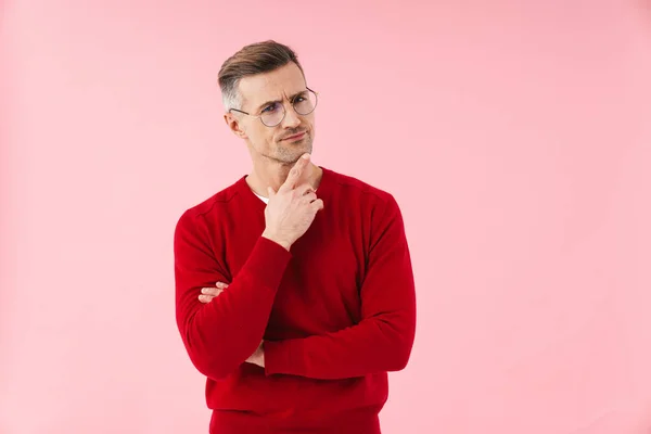 Portrait Handsome Caucasian Man Wearing Eyeglasses Frowning Thinking Isolated Pink — Stock Photo, Image