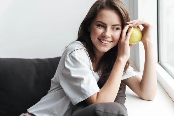 Image Happy Caucasian Woman Casual Shirt Smiling Holding Apple While — Stock Photo, Image