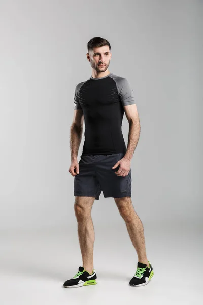 Bild Eines Jungen Unrasierten Mannes Sportbekleidung Der Isoliert Vor Grauem — Stockfoto