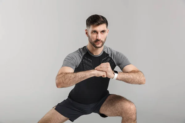 Beeld Van Jonge Atletische Man Sportkleding Doen Oefening Tijdens Het — Stockfoto