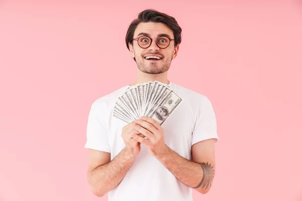 Image Astonished Young Man Wearing Eyeglasses Holding Cash Money Looking — Stock Photo, Image