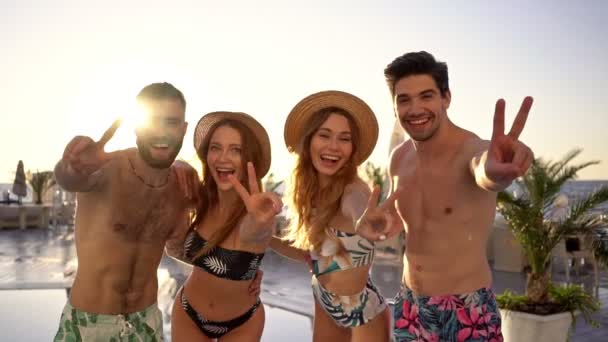 Four Happy Attractive Young Friends Showing Thumbs Gestures Looking Camera — Stock Video