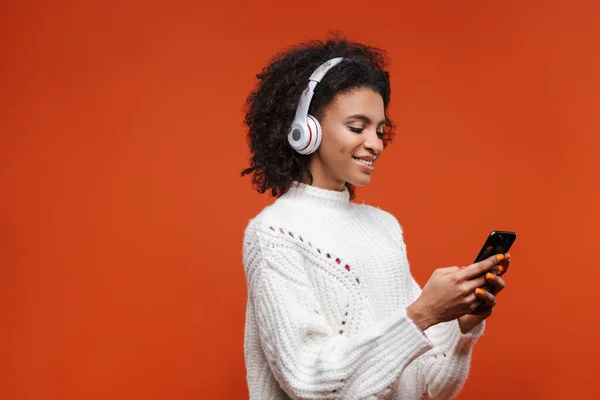Cheerful Attractive Young African Woman Wearing Wireless Headphones Standing Isolated — Stock Photo, Image