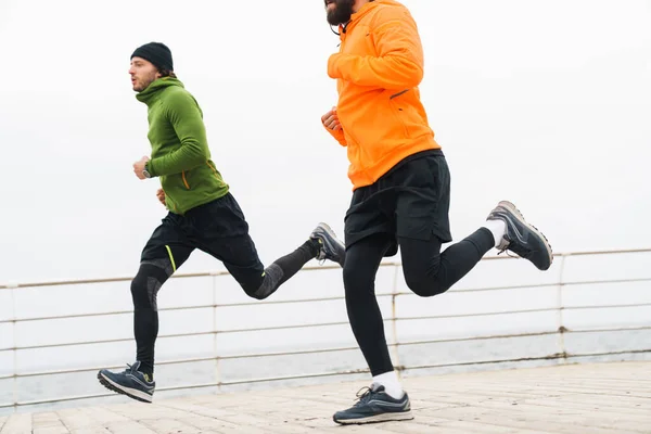 Cropped Image Two Motivated Young Sportsmen Jogging Outdoors Seaside — Stock Photo, Image