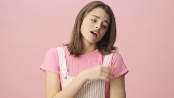 Bored Pretty Brunette Woman Overalls Yawning Covering Her Mouth Pink — Stock Video