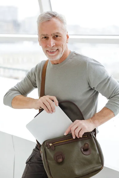 Picture Pleased Senior Grey Haired Bearded Businessman Indoors Put Laptop — Stock Photo, Image