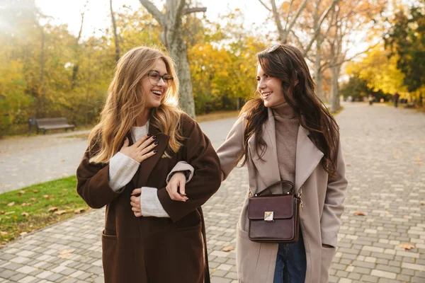 Two Cheerful Young Pretty Girls Wearing Coats Walking Together Autumn — Stock Photo, Image