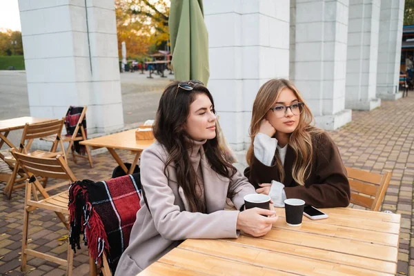 Two Attractive Women Friends Sitting Cafe Outdoors Drinking Coffee — Stock Photo, Image