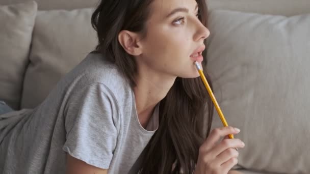 Side View Pretty Brunette Woman Thinking Something Writing Notebook While — Stock Video
