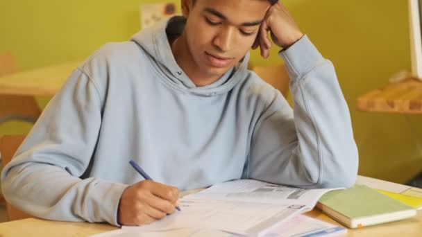 Serious Concentrated Young African Boy Student Studying Doing Homework — Stock Video