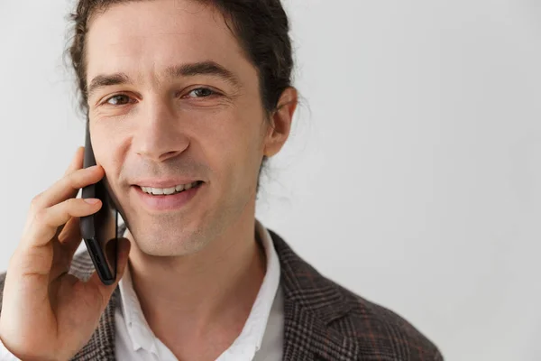 Image Pleased Handsome Man Jacket Smiling Talking Cellphone Isolated White — Stock Photo, Image