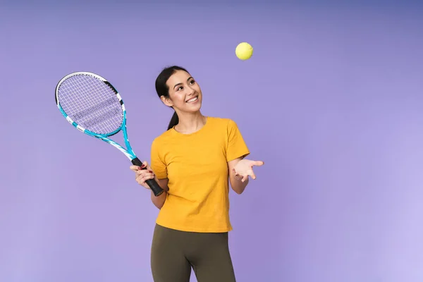 Cheerful Young Pretty Sportswoman Standing Isolated Violet Background Holding Tennis — Stock Photo, Image