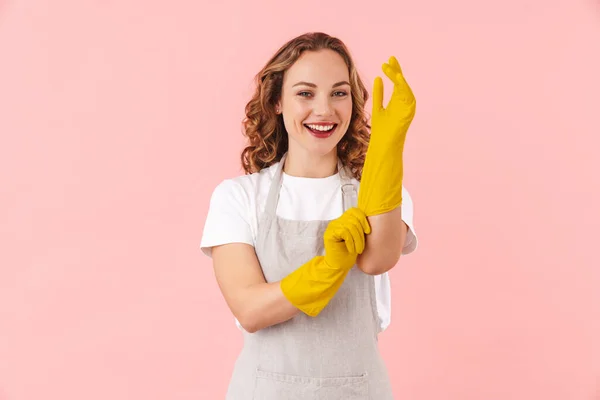 Image Happy Young Woman Housewife Gloves Isolated Pink Wall Background — Stock Photo, Image