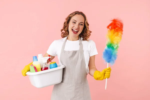 Image Cheerful Pleased Young Housewife Woman Gloves Holding Cleanser Bottles — Stock Photo, Image