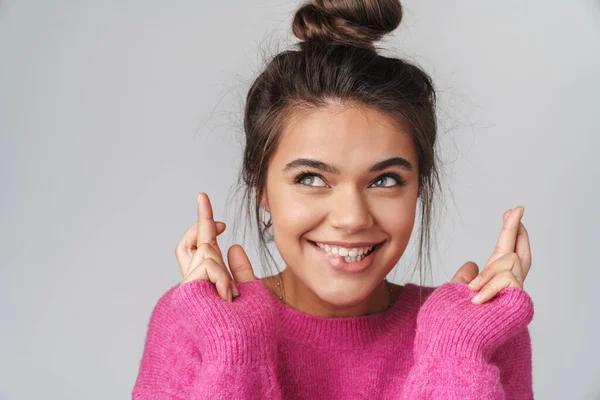 Image Nice Cheerful Woman Pink Sweater Smiling Fingers Crossed Isolated — ストック写真