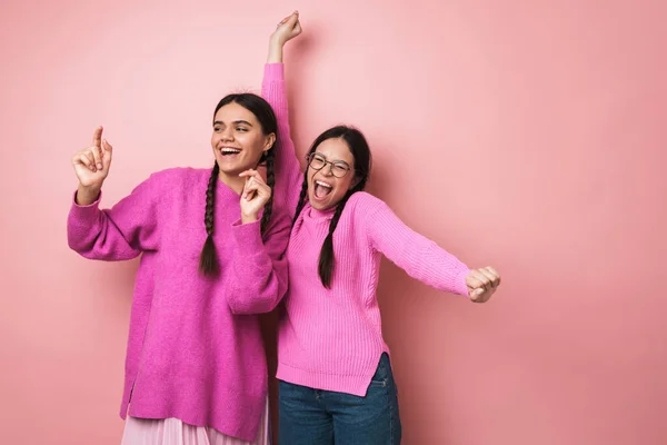 Two Cheerful Cute Teenage Girls Dancing Isolated Pink Background Having — Stock Photo, Image