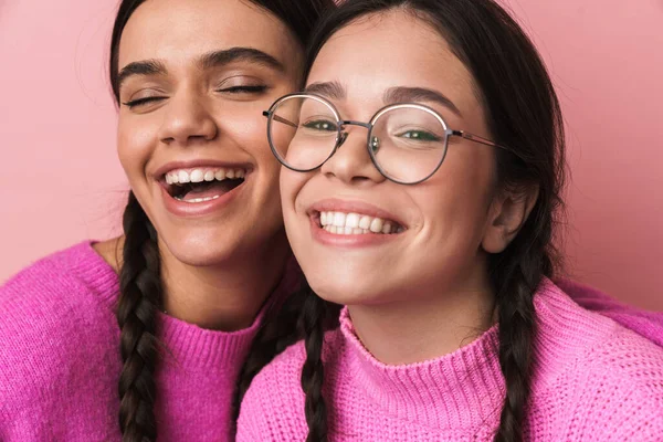 Two Cheerful Cute Teenage Girls Having Fun Isolated Pink Background — Stock Photo, Image