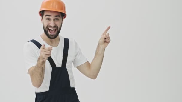 Positive Happy Optimistic Young Bearded Man Builder Isolated White Wall — Stock Video