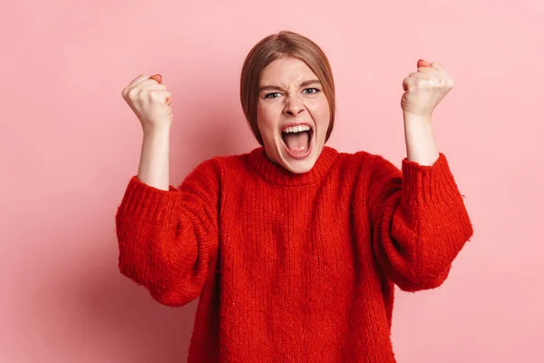 Photo Furious Blonde Woman Red Sweater Screaming Fists Clinched Isolated — ストック写真