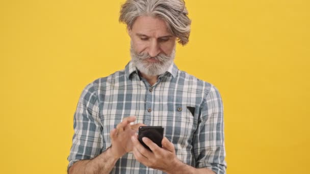 Senior Positive Man Tourist Camera Isolated Yellow Background Holding Passport — Stock Video