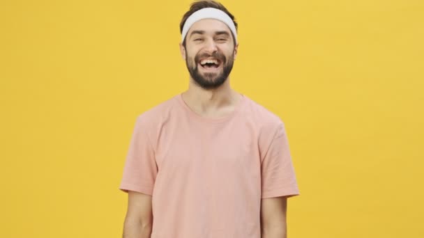 Happy Young Athletic Man Sportswear Laughing Camera Isolated Yellow Background — Stock Video