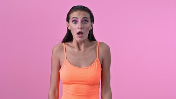 Young Amazing Optimistic Surprised Woman Isolated Pink Wall Background — Stock Video