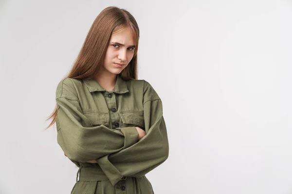Photo Displeased Young Woman Looking Camera Hands Crossed Isolated White — Stock Photo, Image