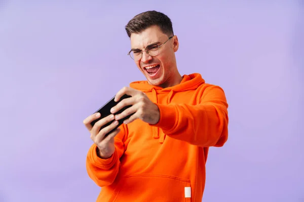 Foto Joven Concentrado Emocional Posando Aislado Sobre Juegos Fondo Púrpura — Foto de Stock