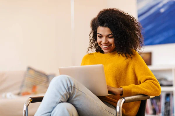 Image Cheerful African American Woman Using Laptop While Sitting Chair — Stock Photo, Image