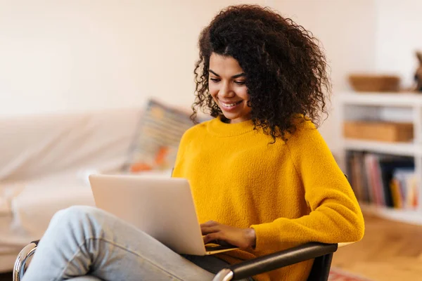 Image Cheerful African American Woman Using Laptop While Sitting Chair — Stock Photo, Image