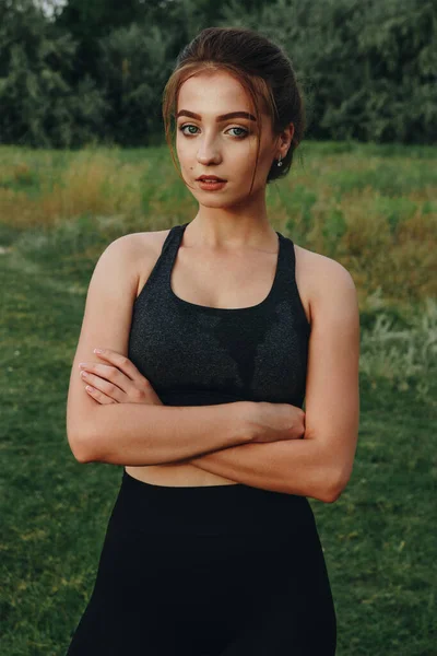 Wet sexy athletic girl after training Stock Photo by ©Milogrodskiy 300486740