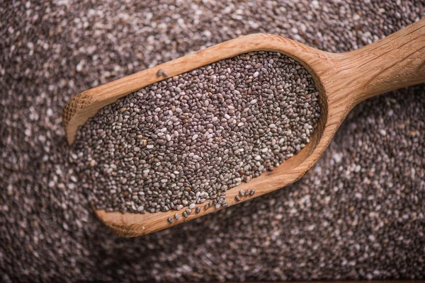 Heathy Chia seeds with wooden spoon — Stock Photo, Image