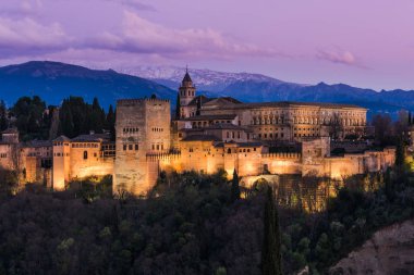 Illuminated Arabic Alhambra palace in Granada,Spain clipart