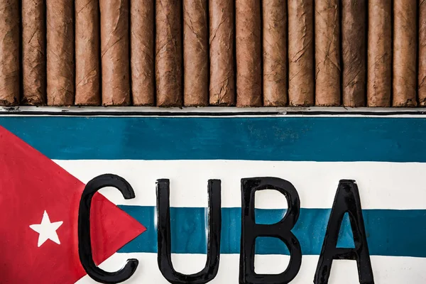 Cuban cigars and cuban flag, top view — Stock Photo, Image