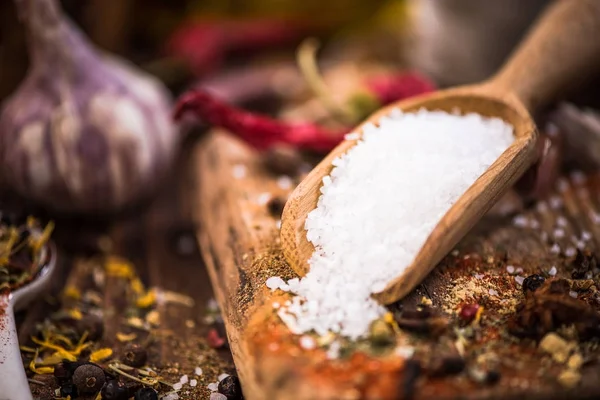 Sea salt on wooden spoon — Stock Photo, Image