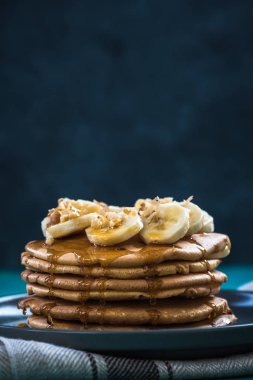 Krep muz, ceviz ve akçaağaç şurubu ile kazık. Kopya alanı