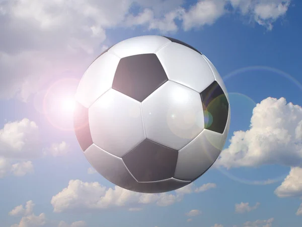 Soccer ball against the sky — Stock Photo, Image