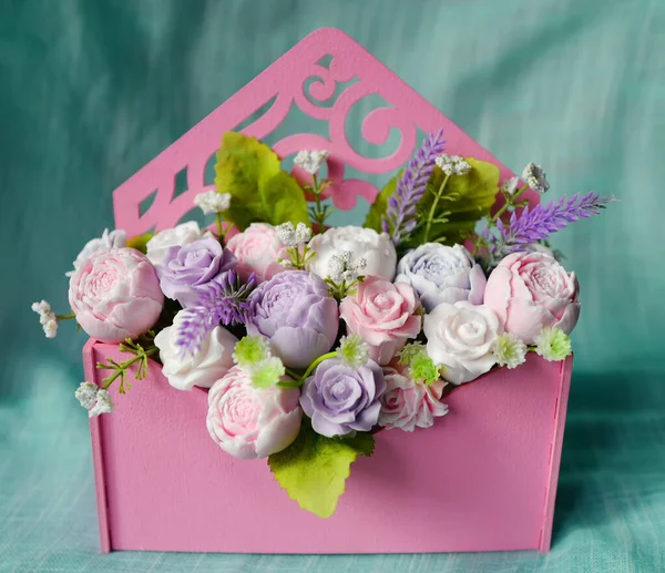 Bouquet of soap flowers in pink envelope