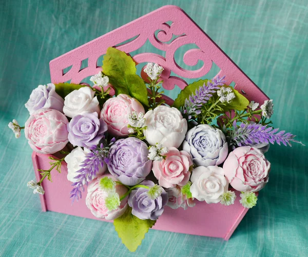 Bouquet of soap flowers in pink envelope