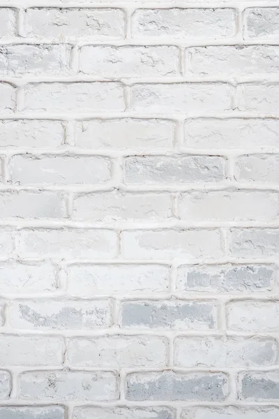 Fondo blanco vertical abstracto de una pared de ladrillo . —  Fotos de Stock