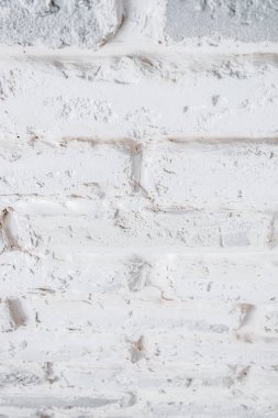 Bir tuğla duvar soyut dikey beyaz arka plan.