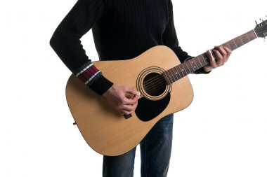A guitarist in jeans and a black sweater, plays an acoustic guitar with a slider, in the center of the frame, on a white background. Horizontal frame. clipart
