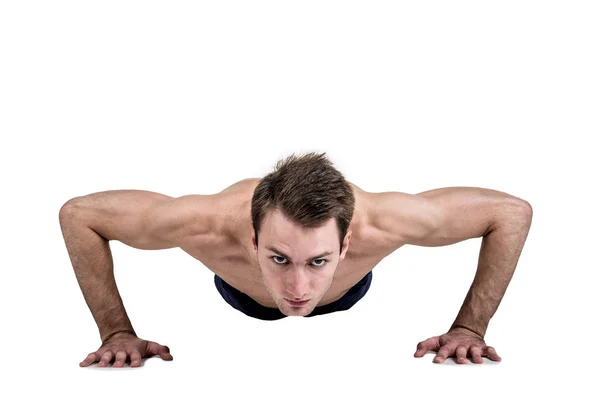 Healthy lifestyle and fitness. Beautiful guy sportive physique, with a naked body, push-up, isolated on a white background. Horizontal frame — Stock Photo, Image