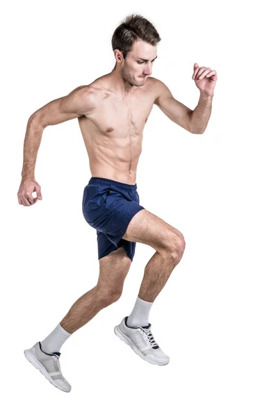 Hälsosam livsstil och fitness. Kör. En stilig kille sport en kroppsbyggnad, med en naken kropp, i en shert, körningar, isolerad på en vit bakgrund. Vertikal ram — Stockfoto
