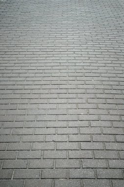 Arka plan, doku tuğla duvar, tüm çerçeve üzerinde gri renk. Dikey Çerçeve