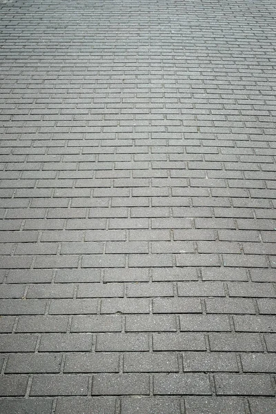 Background, texture brick wall, gray color on the whole frame. Vertical frame — Stock Photo, Image